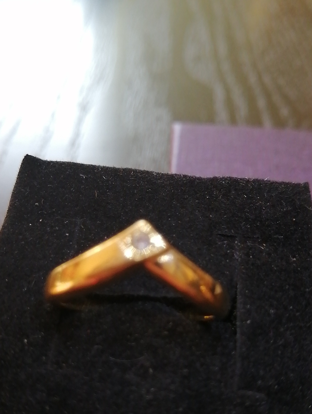 Gold V-Shaped Ring with Single Clear Stone